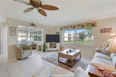 Gorgeous UPDATED Kitchen and Baths. Impact windows and tile on Martin County Golf Course in Florida - for sale on GolfHomes.com, golf home, golf lot