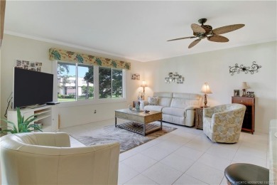 Gorgeous UPDATED Kitchen and Baths. Impact windows and tile on Martin County Golf Course in Florida - for sale on GolfHomes.com, golf home, golf lot