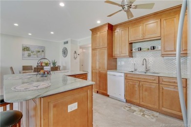 Gorgeous UPDATED Kitchen and Baths. Impact windows and tile on Martin County Golf Course in Florida - for sale on GolfHomes.com, golf home, golf lot