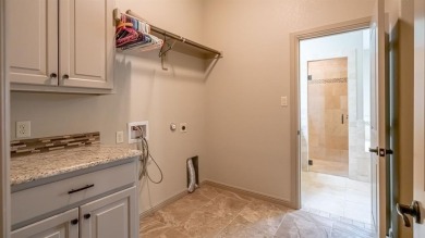 This lakefront home is located in the prestigious gated on Harbor Lakes Golf Club in Texas - for sale on GolfHomes.com, golf home, golf lot