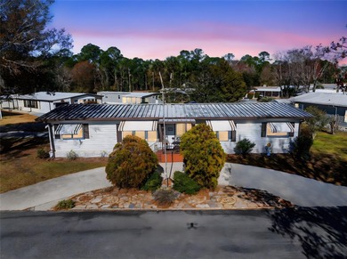 Welcome to resort-style living in Kove Estates, a sought-after on Cypress Point RV Golf Club in Florida - for sale on GolfHomes.com, golf home, golf lot