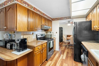 Welcome to resort-style living in Kove Estates, a sought-after on Cypress Point RV Golf Club in Florida - for sale on GolfHomes.com, golf home, golf lot