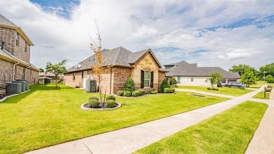 This lakefront home is located in the prestigious gated on Harbor Lakes Golf Club in Texas - for sale on GolfHomes.com, golf home, golf lot