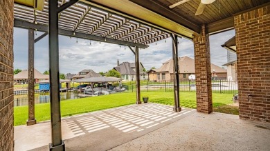 This lakefront home is located in the prestigious gated on Harbor Lakes Golf Club in Texas - for sale on GolfHomes.com, golf home, golf lot