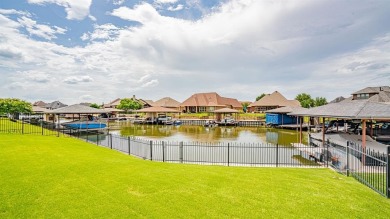 This lakefront home is located in the prestigious gated on Harbor Lakes Golf Club in Texas - for sale on GolfHomes.com, golf home, golf lot
