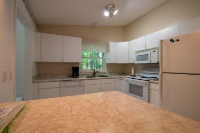 Nestled in a quiet and secluded area of Canadian Lakes, this on Canadian Lakes Country Club-The Royal Course in Michigan - for sale on GolfHomes.com, golf home, golf lot
