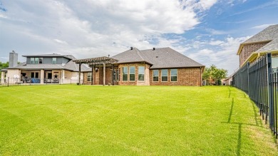 This lakefront home is located in the prestigious gated on Harbor Lakes Golf Club in Texas - for sale on GolfHomes.com, golf home, golf lot