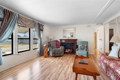 Welcome to resort-style living in Kove Estates, a sought-after on Cypress Point RV Golf Club in Florida - for sale on GolfHomes.com, golf home, golf lot