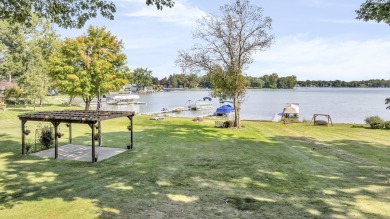 LUXURIOUS LAKEFRONT HOME ON MICHIGAN'S CRYSTAL CLEAR  CARRIBEAN on Deer Run Golf Club in Michigan - for sale on GolfHomes.com, golf home, golf lot