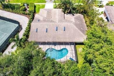 Situated  on a secluded lot, this delightful home masterfully on Delaire Golf and Country Club in Florida - for sale on GolfHomes.com, golf home, golf lot