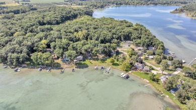 LUXURIOUS LAKEFRONT HOME ON MICHIGAN'S CRYSTAL CLEAR  CARRIBEAN on Deer Run Golf Club in Michigan - for sale on GolfHomes.com, golf home, golf lot