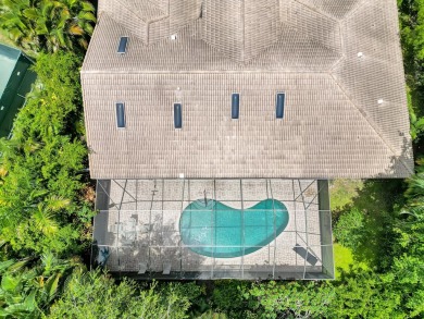 Situated  on a secluded lot, this delightful home masterfully on Delaire Golf and Country Club in Florida - for sale on GolfHomes.com, golf home, golf lot