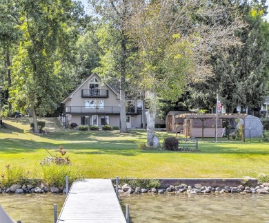 LUXURIOUS LAKEFRONT HOME ON MICHIGAN'S CRYSTAL CLEAR  CARRIBEAN on Deer Run Golf Club in Michigan - for sale on GolfHomes.com, golf home, golf lot