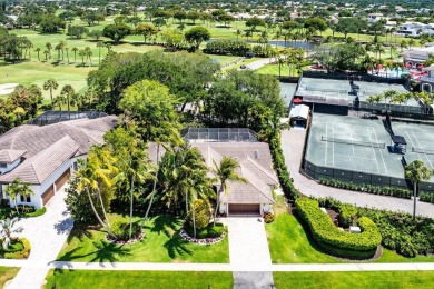 Situated  on a secluded lot, this delightful home masterfully on Delaire Golf and Country Club in Florida - for sale on GolfHomes.com, golf home, golf lot