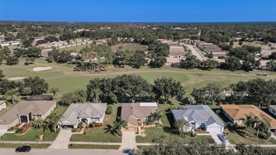 From the elegant front portico and pristine landscaping to the on Heritage Pines Country Club in Florida - for sale on GolfHomes.com, golf home, golf lot