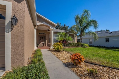 From the elegant front portico and pristine landscaping to the on Heritage Pines Country Club in Florida - for sale on GolfHomes.com, golf home, golf lot