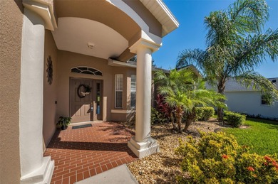 From the elegant front portico and pristine landscaping to the on Heritage Pines Country Club in Florida - for sale on GolfHomes.com, golf home, golf lot