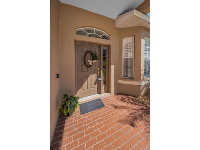 From the elegant front portico and pristine landscaping to the on Heritage Pines Country Club in Florida - for sale on GolfHomes.com, golf home, golf lot