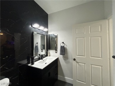 Stylish 2-Bed, 2-Bath Condo in a Gated Community Next to Desert on Desert Rose Golf Course in Nevada - for sale on GolfHomes.com, golf home, golf lot