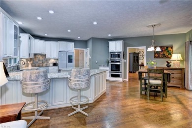 Located at the end of a quiet cul-de-sac on the 10th hole of the on Fords Colony Country Club in Virginia - for sale on GolfHomes.com, golf home, golf lot
