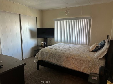 **Charming 3-Bedroom, 2-Bathroom Manufactured Home in Prime on Green River Golf Club in California - for sale on GolfHomes.com, golf home, golf lot