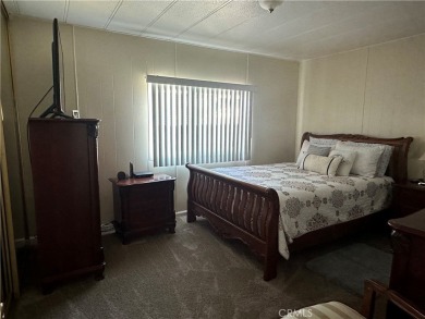 **Charming 3-Bedroom, 2-Bathroom Manufactured Home in Prime on Green River Golf Club in California - for sale on GolfHomes.com, golf home, golf lot