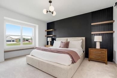 This new reverse 1.5-story Somerset plan by Elevate Design + on Heritage Park Golf Course in Kansas - for sale on GolfHomes.com, golf home, golf lot