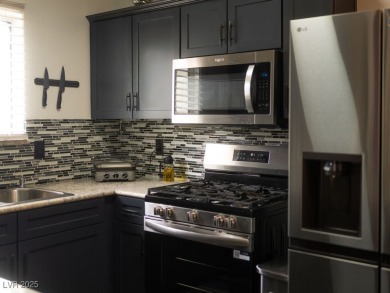 Stylish 2-Bed, 2-Bath Condo in a Gated Community Next to Desert on Desert Rose Golf Course in Nevada - for sale on GolfHomes.com, golf home, golf lot