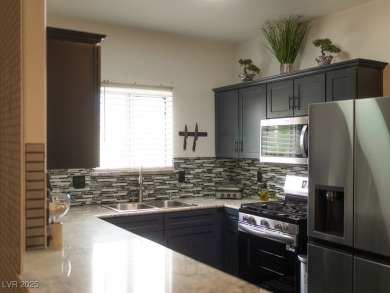 Stylish 2-Bed, 2-Bath Condo in a Gated Community Next to Desert on Desert Rose Golf Course in Nevada - for sale on GolfHomes.com, golf home, golf lot