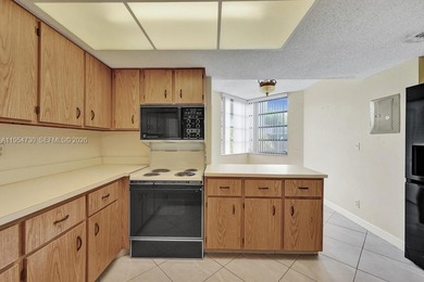 RARELY AVAILABLE AT THIS PRICE! Welcome to this spacious TRUE on Pine Island Ridge Country Club in Florida - for sale on GolfHomes.com, golf home, golf lot