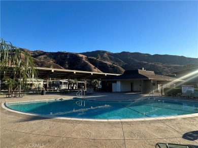 **Charming 3-Bedroom, 2-Bathroom Manufactured Home in Prime on Green River Golf Club in California - for sale on GolfHomes.com, golf home, golf lot