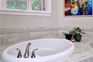 Located at the end of a quiet cul-de-sac on the 10th hole of the on Fords Colony Country Club in Virginia - for sale on GolfHomes.com, golf home, golf lot