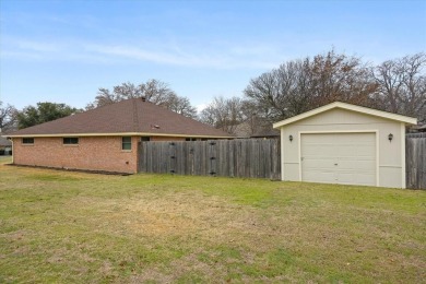 This beautiful 3-bedroom, 2-bathroom home is situated on a on De Cordova Bend Country Club in Texas - for sale on GolfHomes.com, golf home, golf lot