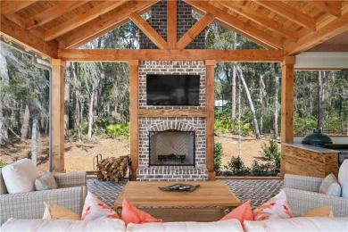 Welcome to this stunning marshfront masterpiece--a custom-built on Frederica Golf Club in Georgia - for sale on GolfHomes.com, golf home, golf lot