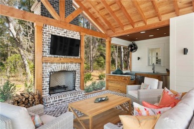 Welcome to this stunning marshfront masterpiece--a custom-built on Frederica Golf Club in Georgia - for sale on GolfHomes.com, golf home, golf lot