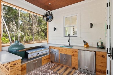 Welcome to this stunning marshfront masterpiece--a custom-built on Frederica Golf Club in Georgia - for sale on GolfHomes.com, golf home, golf lot