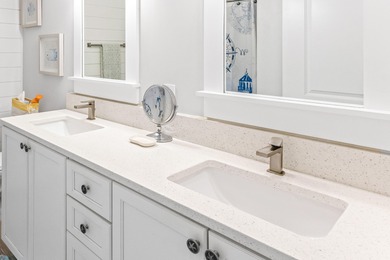 An exceptional corner residence in Lasata at Baytowne Wharf on Sandestin Golf and Beach Resort - Raven in Florida - for sale on GolfHomes.com, golf home, golf lot