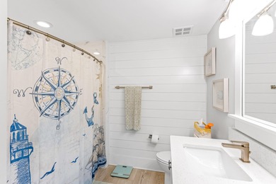 An exceptional corner residence in Lasata at Baytowne Wharf on Sandestin Golf and Beach Resort - Raven in Florida - for sale on GolfHomes.com, golf home, golf lot