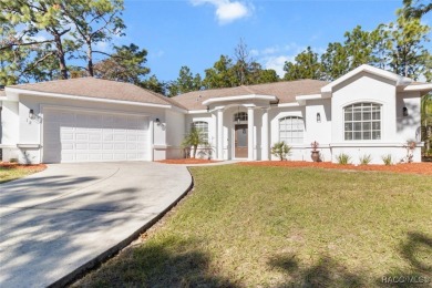 This spacious and inviting three-bedroom, plus den, two-bath on Sugarmill Woods Golf and Country Club in Florida - for sale on GolfHomes.com, golf home, golf lot