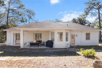 This spacious and inviting three-bedroom, plus den, two-bath on Sugarmill Woods Golf and Country Club in Florida - for sale on GolfHomes.com, golf home, golf lot