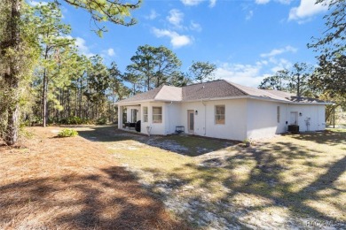 This spacious and inviting three-bedroom, plus den, two-bath on Sugarmill Woods Golf and Country Club in Florida - for sale on GolfHomes.com, golf home, golf lot