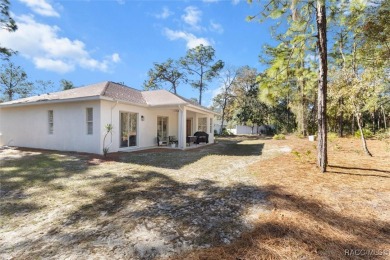 This spacious and inviting three-bedroom, plus den, two-bath on Sugarmill Woods Golf and Country Club in Florida - for sale on GolfHomes.com, golf home, golf lot