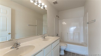 Discover this top-floor 3-bedroom, 3-bathroom condo with a on The Club At Old Kinderhook in Missouri - for sale on GolfHomes.com, golf home, golf lot