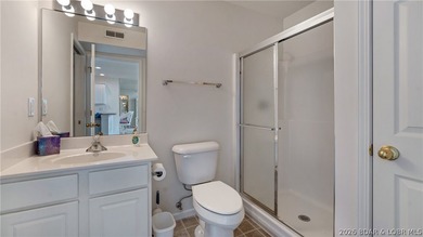 Discover this top-floor 3-bedroom, 3-bathroom condo with a on The Club At Old Kinderhook in Missouri - for sale on GolfHomes.com, golf home, golf lot