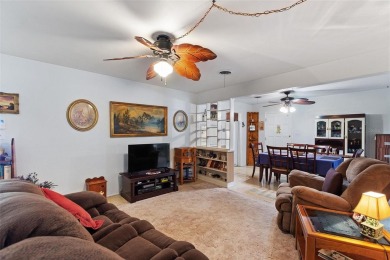 Nestled on a spacious half-acre lot in the desirable Indian Lake on Indian Lake Estates Golf and Country Club in Florida - for sale on GolfHomes.com, golf home, golf lot