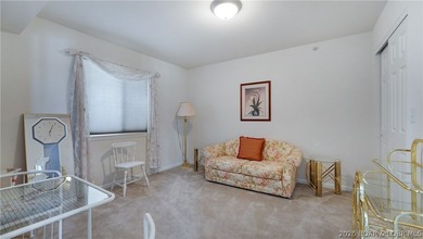 Discover this top-floor 3-bedroom, 3-bathroom condo with a on The Club At Old Kinderhook in Missouri - for sale on GolfHomes.com, golf home, golf lot