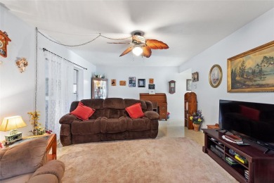 Nestled on a spacious half-acre lot in the desirable Indian Lake on Indian Lake Estates Golf and Country Club in Florida - for sale on GolfHomes.com, golf home, golf lot