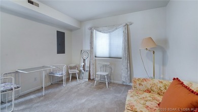 Discover this top-floor 3-bedroom, 3-bathroom condo with a on The Club At Old Kinderhook in Missouri - for sale on GolfHomes.com, golf home, golf lot