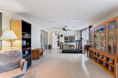 Nestled on a spacious half-acre lot in the desirable Indian Lake on Indian Lake Estates Golf and Country Club in Florida - for sale on GolfHomes.com, golf home, golf lot