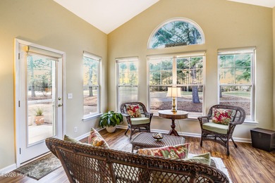 Golf-front living, sunset views, and coastal convenience-this on Meadowlands Golf Club in North Carolina - for sale on GolfHomes.com, golf home, golf lot